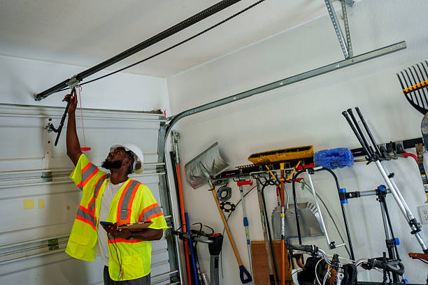 Professional Garage Door Panel Replacement technician working in Friendship Heights Village, MD
